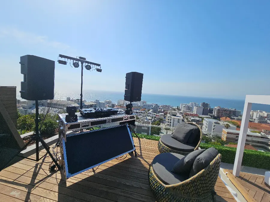 Professional audio setup on Cape Town rooftop with city views